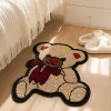 Beige teddy bear embroidered patchwork with red bow and red nose tip decoration DIY handmade fabric accessories details Picture